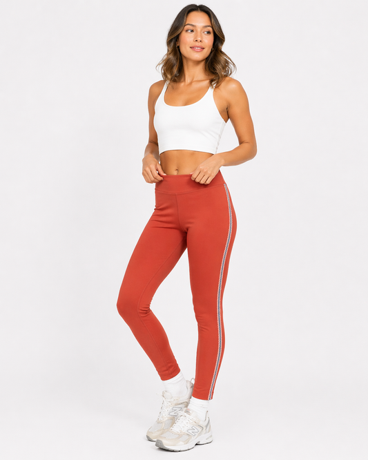 Nike High-Rise Coral Leggings – Sculpting Fit with Side Detail (Size Small)